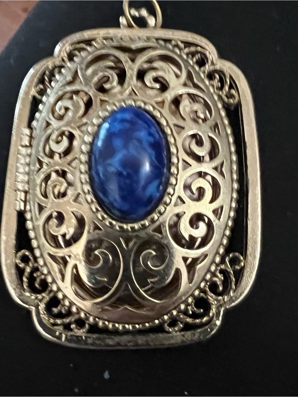 Gold-Tone Filigree Pendant with Blue Oval Stone